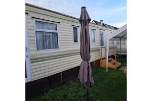 Te koop stacaravan 11 x 3,70 meter