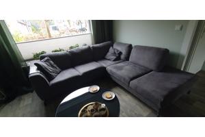 Ruime grijze hoekbank