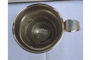 Oude Gero 90 verzilverde geboortebeker met bestek.