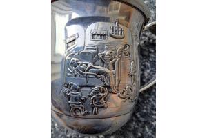 Oude Gero 90 verzilverde geboortebeker met bestek.