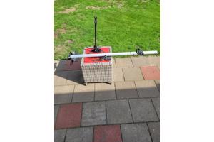 Racefietsdrager voor bagagerek op kofferdeksel.