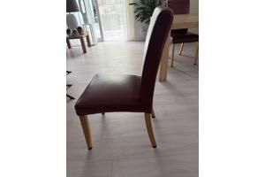 Vier prima leren eethoekstoelen