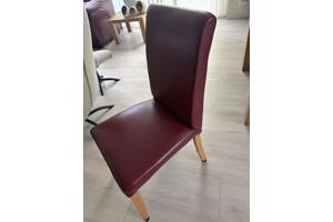 Vier prima leren eethoekstoelen