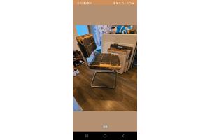 Vier eetkamerstoelen met leer