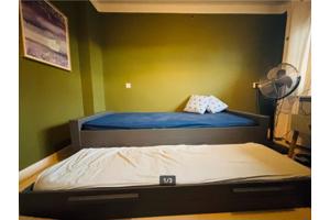 Kinderbed grijs met lade voor extra bed