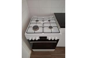 Gasfornuis met elektrische oven in goede staat