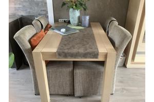 Tv kast eiken. Uitschuifbare tafel met stoelen