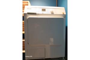 Miele Wasdroger met constant melding: " pluizen verwijderen"