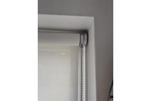 Rolgordijn doorzichtig. Breed 1.28 m