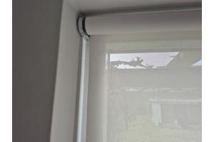 Rolgordijn doorzichtig. Breed 1.28 m