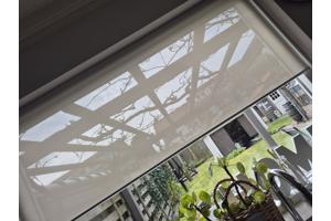 Rolgordijn doorzichtig. Breed 1.28 m