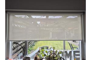 Rolgordijn doorzichtig. Breed 1.28 m