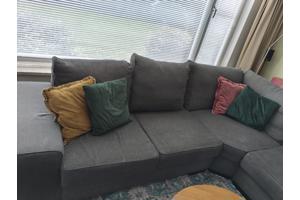 Grote grijze hoekbank