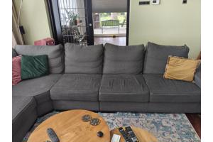 Grote grijze hoekbank