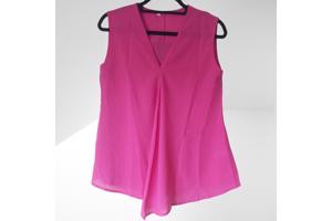 Luchtig mouwloos effen shirt donker roze M