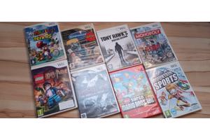 Nintendo Wii + 2 controllers + 2 nunchuks + 8 spelletjes
