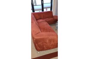 Rode hoek bank met lounge gedeelte