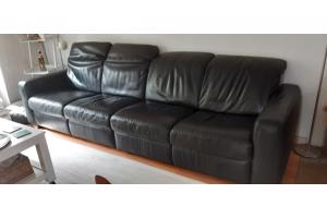 Zwart leren (hoek) bank in prima staat