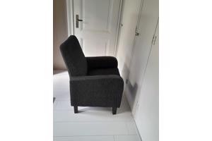 Grijze fauteuil