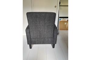 Grijze fauteuil