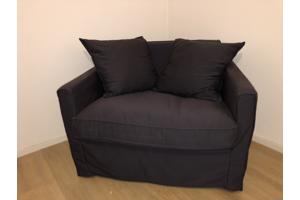 Donkerblauwe fauteuil