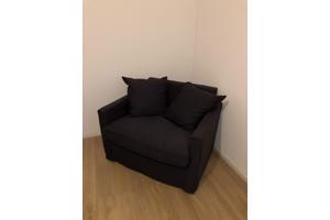 Donkerblauwe fauteuil