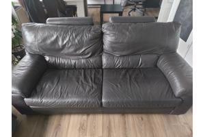 Bruine leren driezitter bank