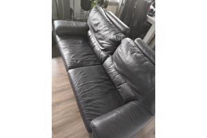 Bruine leren driezitter bank