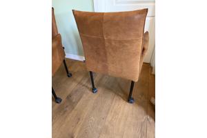 Drie leren eetkamerstoelen