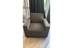 Grijze fauteuil
