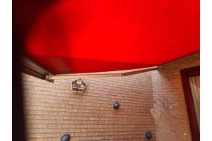 Eletrice zonnescherm 450 breed uitval 250 oranje werk uitste