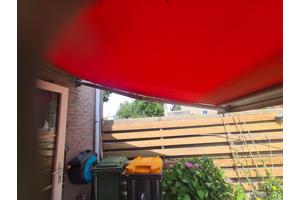 Eletrice zonnescherm 450 breed uitval 250 oranje werk uitste