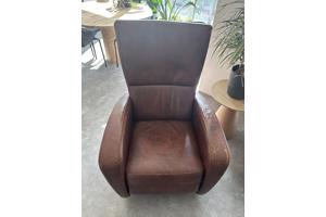 leren fauteuil met beensteun