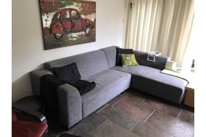 Hoekbank 250 bij 187cm van stof