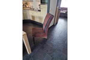^leren met suede stoelen moeten weg ivm nieuw