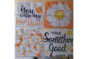 Set van 4 kussenhoezen bloem en tekst wit oranje geel 40x40c