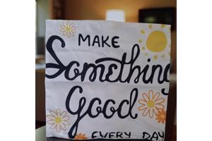 Set van 4 kussenhoezen bloem en tekst wit oranje geel 40x40c