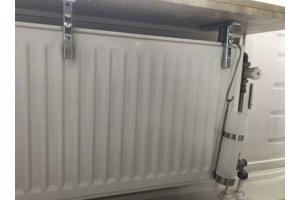 4 verstelbare plankdragers voor de radiator