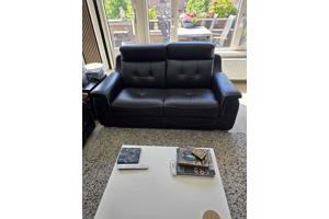 Lederen bankstel met relaxfunctiei