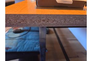 Eettafel modern staal onderstel blad beschadigd