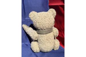 Beer knuffel met metalen bril en stropdas