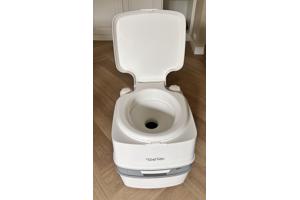 Gebruikt maar absoluut schone Porta Potti toilet