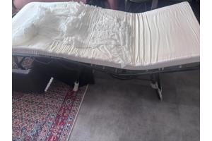 Uitklapbare poef