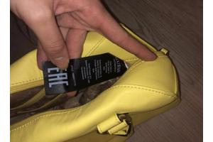 Gele Guess hand tas in goede conditie.