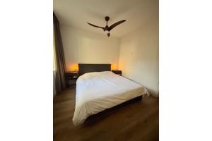 Twee persoons boxspring incl matrassen en hoofdbord - grijs