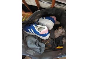 Bag of women's clothing and some shoes