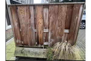 Twee verrijdbare schuttingen voor terras