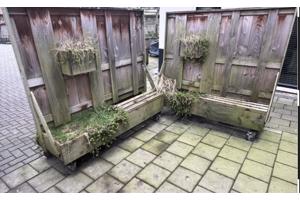 Twee verrijdbare schuttingen voor terras