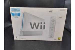 Nintendo Wii console + 2 controllers + 1 nunchuk + 11 games