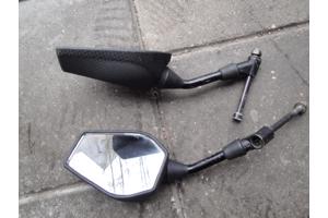 Brommer koffer en twee spiegel.